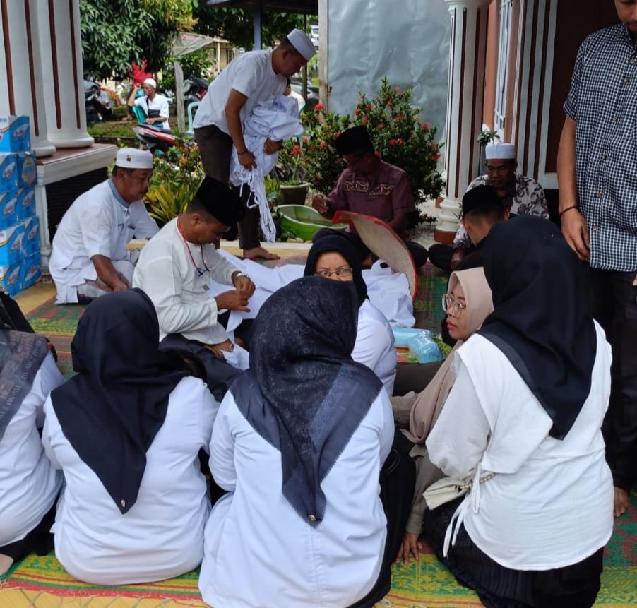 Kadis Kominfo Merangin Pimpin Apel, Sampaikan Duka Cita dan Lakukan Takziah